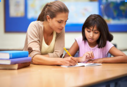 A person helping a child with her homeworkAI-generated content may be incorrect.